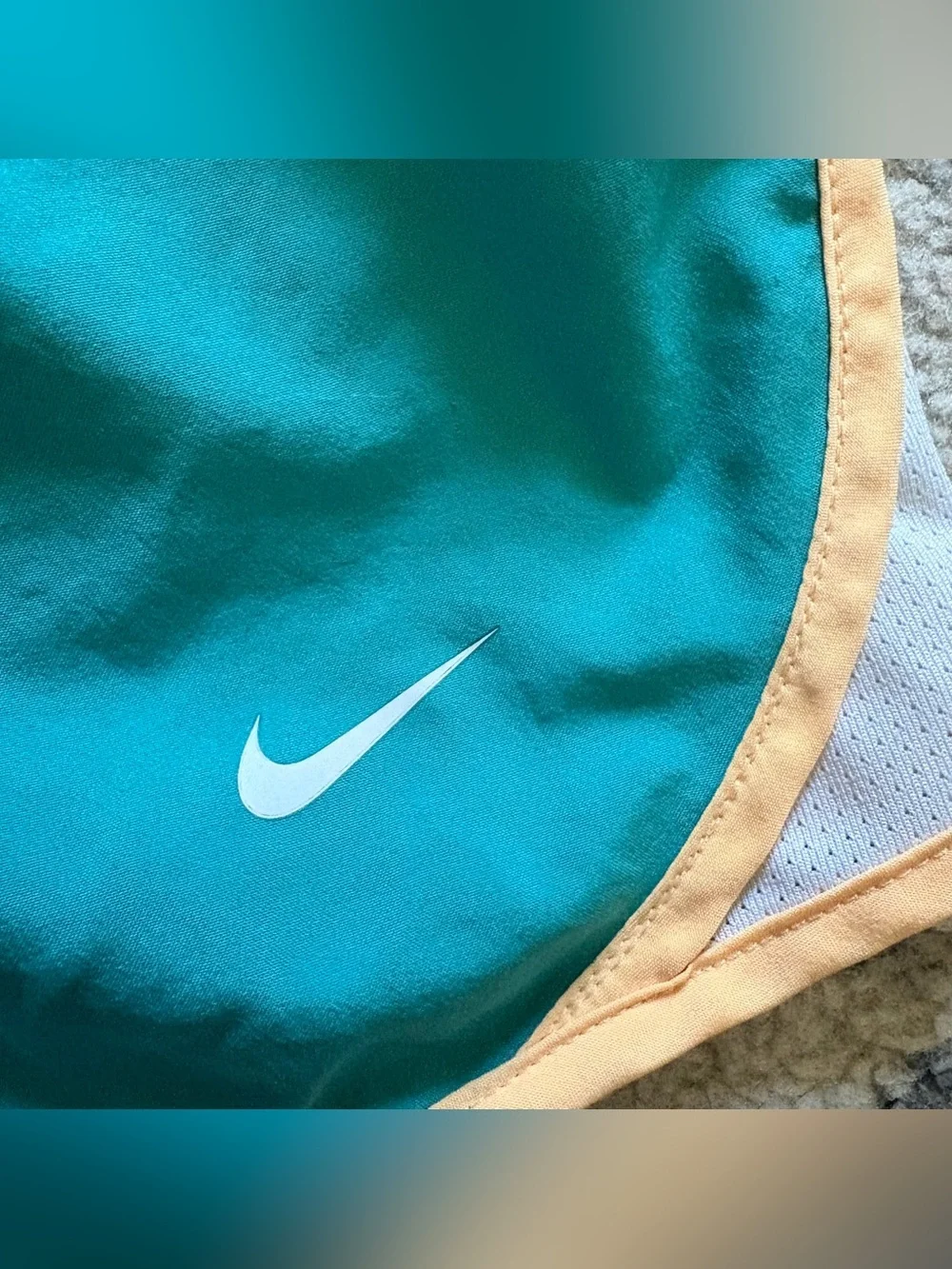 Nike Girls size M Teal Athletic Shorts with Orange Trim